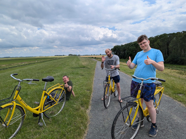 smiling faces on bikes